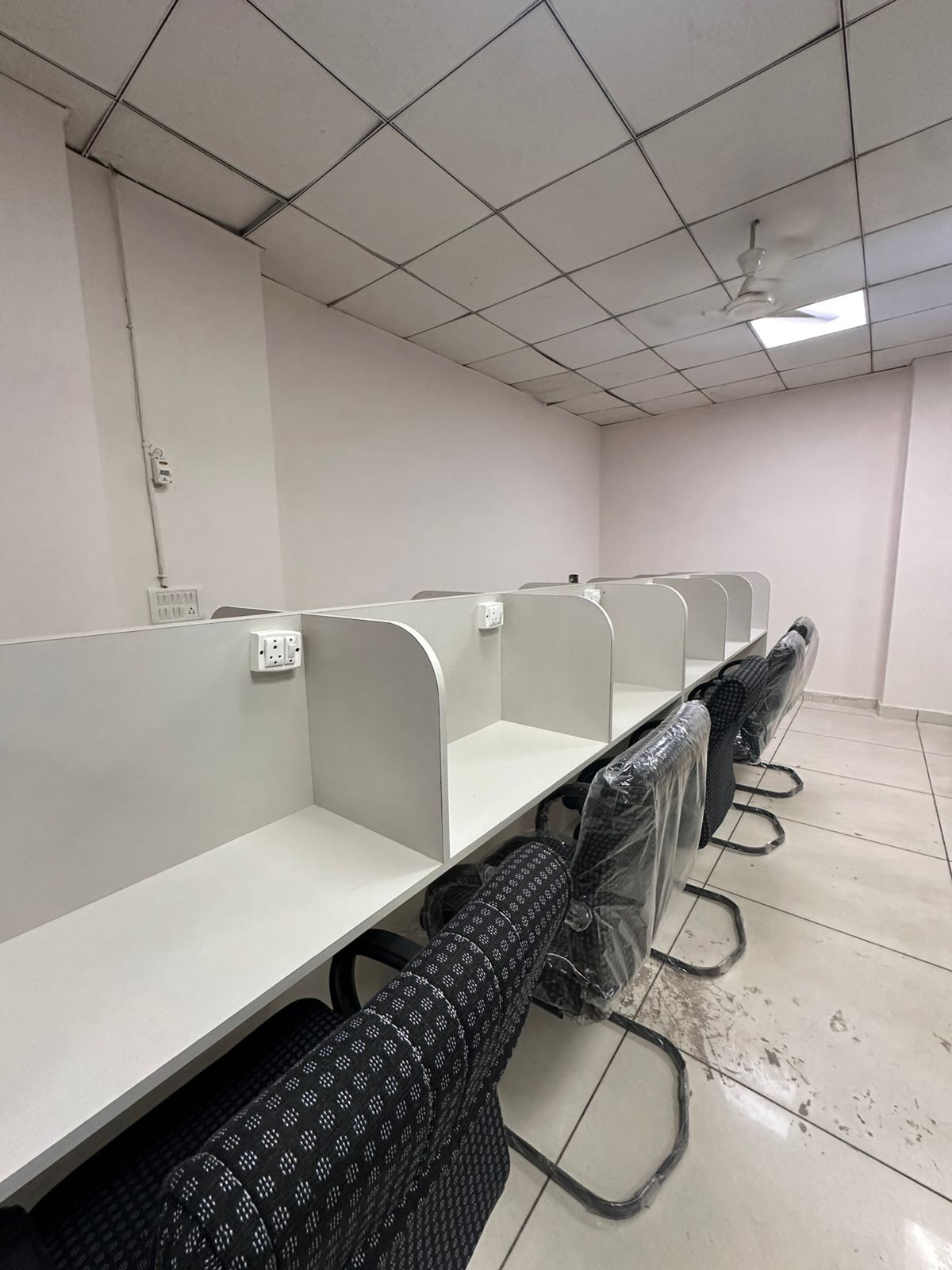 Close-up of library study pods with power outlets